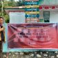 Pemasangan Baliho seleksi PPS Pemilu Serentak 2024 Desa Batuampa. Foto: Istimewa