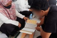 Pembimbingan bacaan Al-Qur'an dan Iqra Warga Binaan