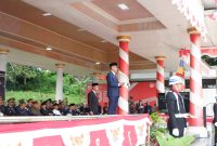 Pj. Gubernur Sulbar membacakan sambutan Menkumham RI pada puncak peri