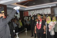 Prosesi Pedang Pora pada acara pisah sambut Kepala Divisi Pemasyarakatan Kanwil Kemenkumham Sulbar